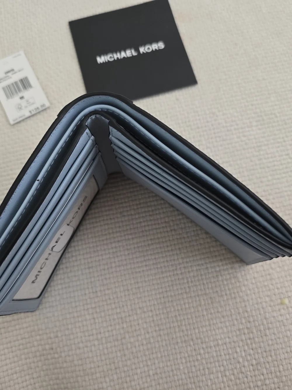 Michael Kors Deep Blue MK Monogram Bifold Wallet with Light Blue Side Trim